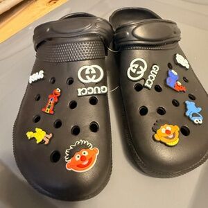 Croc style clogs with charms